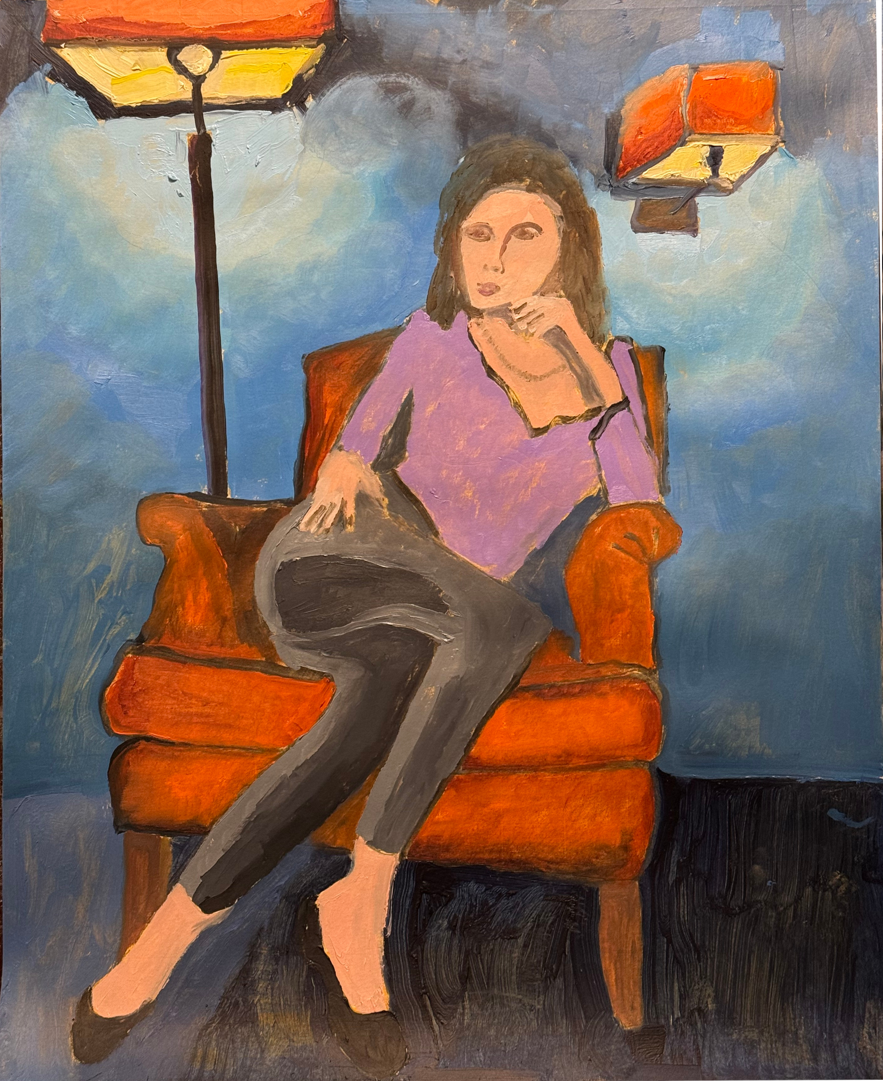 A femme presenting woman in lavender top and black leggings crosses her legs